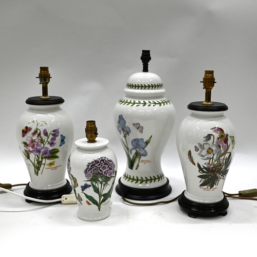 514 - Four Portmeirion ceramic lamps of differing patterns to include: Christmas Rose (41cm); Iris (45.5cm... 