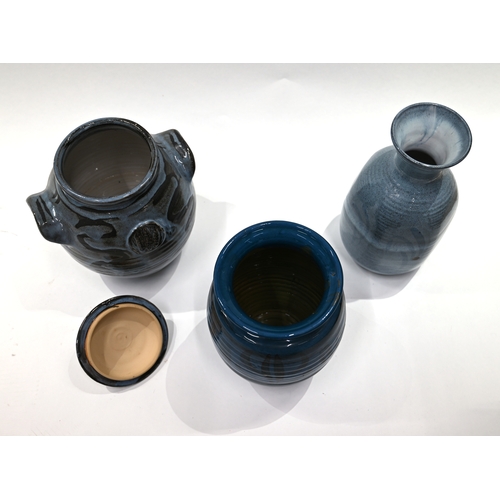 519 - Three items of Cricklade pottery, to include 2 vases and a lidded pot, all in a blue colour. Part of... 