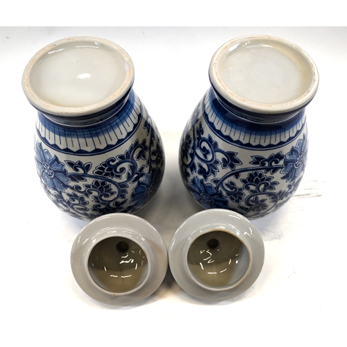 522 - A pair of large baluster Blue and White Temple jars with lids. Flower and vine decoration. Dimension... 