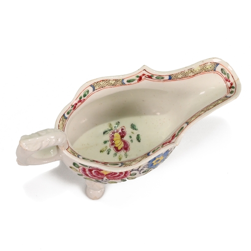 532 - A good Bow famille rose pattern footed sauceboat, circa 1750. Hand painted over glaze floral design ... 