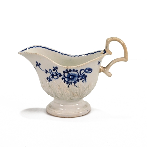 533 - A John Pennington of Liverpool porcelain blue and white over-glaze creamer. The foot with beaded mou... 