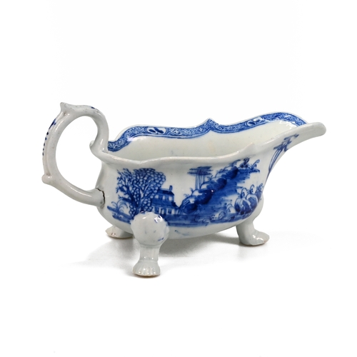 534 - Mid 18th Century three footed blue and white Bow sauce boat. The outside of the bowl decorated with ... 