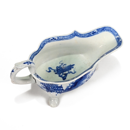 534 - Mid 18th Century three footed blue and white Bow sauce boat. The outside of the bowl decorated with ... 