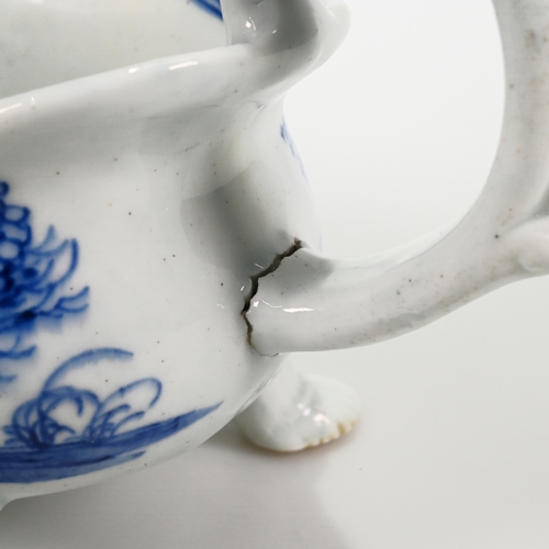 534 - Mid 18th Century three footed blue and white Bow sauce boat. The outside of the bowl decorated with ... 