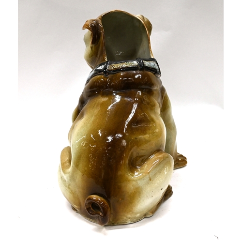 535 - A majolica stick or umbrella stand in the form of a seated pug, made by the Belgian pottery Mouzin o... 