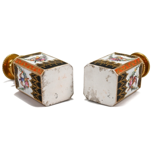 536 - A pair of 19th Century Sèvres tea caddies complete with stoppers, richly illustrated with birds of p... 