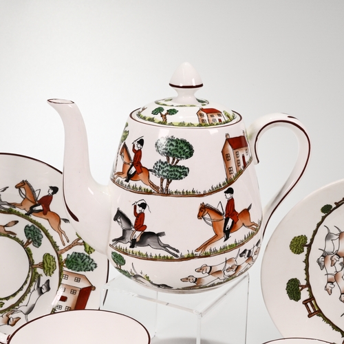 552 - A Staffordshire hunting scene part tea set comprising teapot, milk jug, sugar bowl, oval dish, two c... 