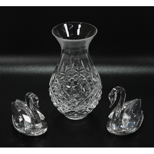 568 - Glassware to include a collection of Swarovski glass comprising: A large (12cm) Waterlily candle hol... 