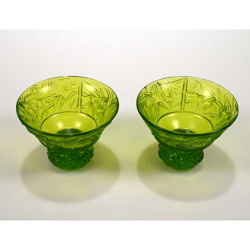 570 - A pair of Liuligongfang Liuli Living green glass tea cups, each etched to base Liuli Living 2015, wi... 