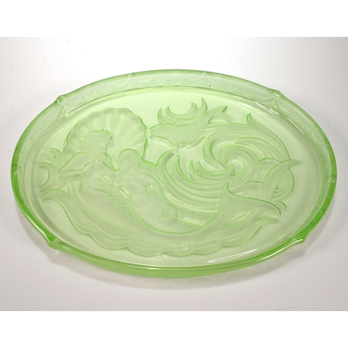 571 - A Walther & Sohne 1930's frosted green Uranium glass Nymphen dressing table set comprising tray, two... 