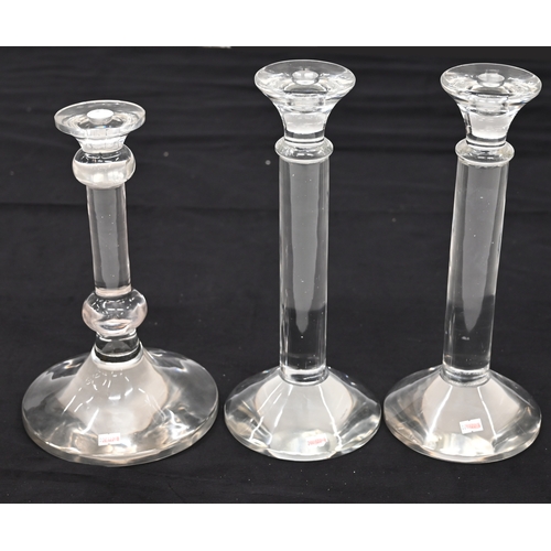 574 - A pair of contemporary large glass candlesticks and a smaller single glass candlestick (3). Pair eac... 