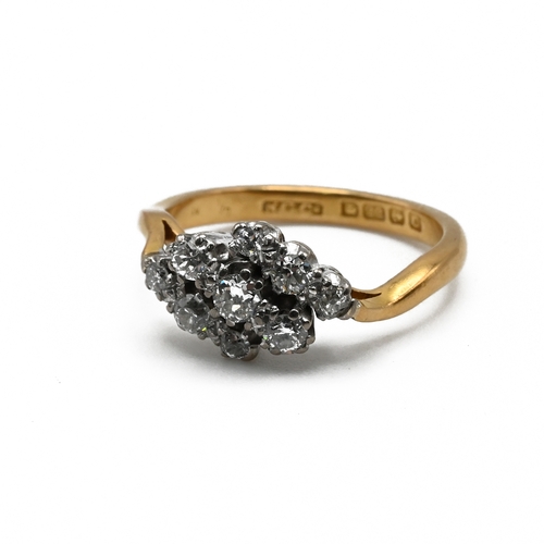 66 - A nine stone diamond cluster ring, to a 22 carat gold shank, the three rows of three diamonds estima... 