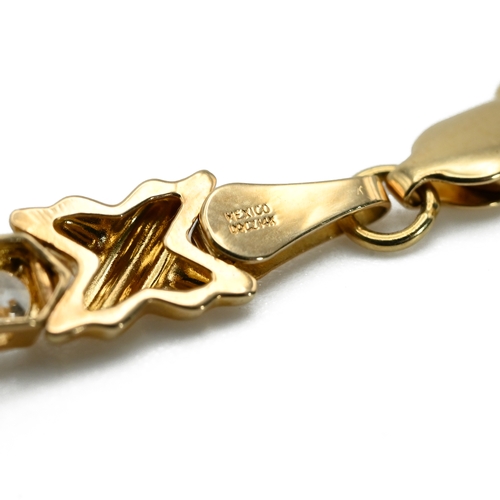 69 - A cubic zirconia set bracelet, stamped ’14K’, 20.5cm long, 6.8 grams gross; a QVC 9 carat gold carve... 