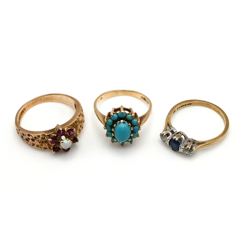 77 - A 9 carat gold three stone sapphire and diamond ring; with a 9 carat gold turquoise cluster ring;and... 
