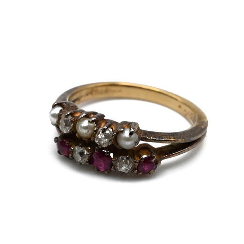85 - A Victorian double ring, unmarked, the one alternate set with three rubies and two old cut diamonds,... 