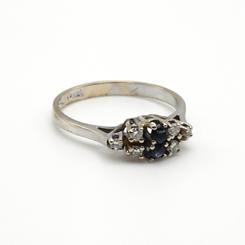 89 - A sapphire and diamond dress ring, the white metal mount stamped ‘585’, finger size P, 2.7 grams gro... 