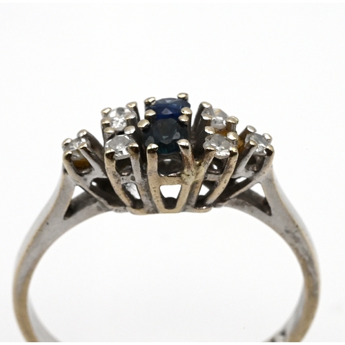 89 - A sapphire and diamond dress ring, the white metal mount stamped ‘585’, finger size P, 2.7 grams gro... 
