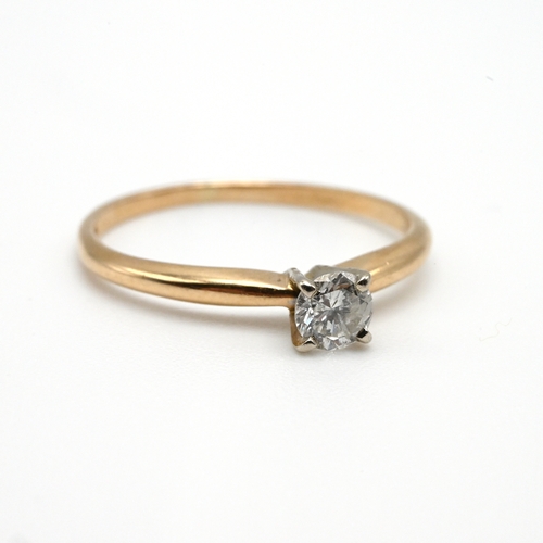 90 - A single stone diamond ring, stamped ‘14K’, the brilliant cut weighing 0.2 carats estimated, finger ... 
