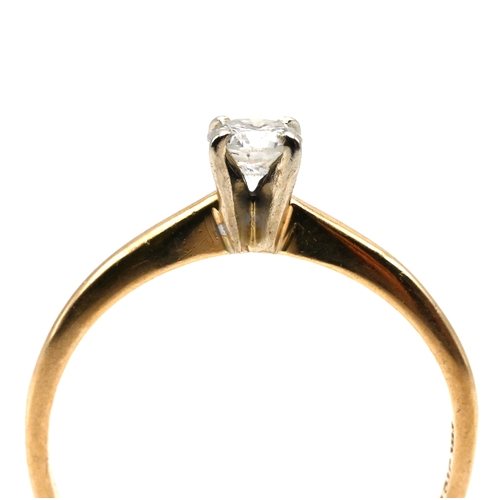 90 - A single stone diamond ring, stamped ‘14K’, the brilliant cut weighing 0.2 carats estimated, finger ... 