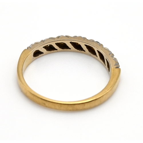 97 - A seven stone diamond set 18 carat gold half hoop ring, the uniform brilliant cuts totalling 0.2 car... 
