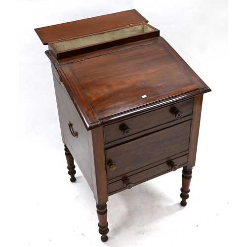 1017 - A Victorian mahogany washstand with sloping top opening to reveal recesses for wash bowl and a brass... 