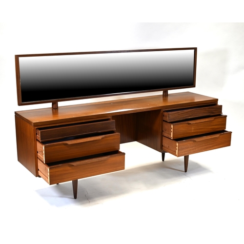 1021 - A 1960's Teak dressing table and upholstered stool by White & Newton. Mirror can be angled either ve... 