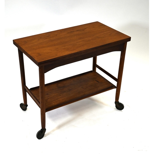 1022 - A vintage 1950's Teak two shelf drinks trolley on wheels with fold over top. Unmarked. H 66cm, w 76c... 