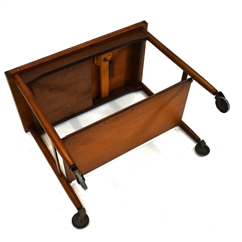 1022 - A vintage 1950's Teak two shelf drinks trolley on wheels with fold over top. Unmarked. H 66cm, w 76c... 