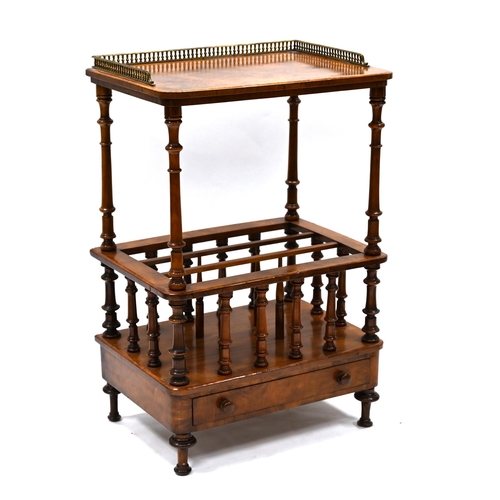 1028 - A mid 19th Century walnut Canterbury with gilt cast metal gallery to top. Turned supports and rails ... 