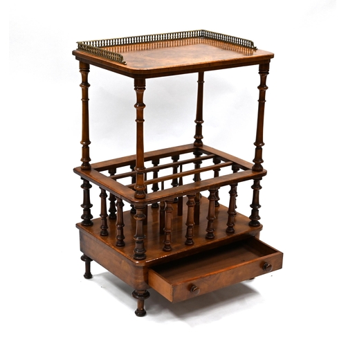 1028 - A mid 19th Century walnut Canterbury with gilt cast metal gallery to top. Turned supports and rails ... 