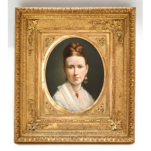 580 - Dutch School, circa 1890-1910. Bust Portrait of a Young Woman, wearing a medallion with an inset flo... 