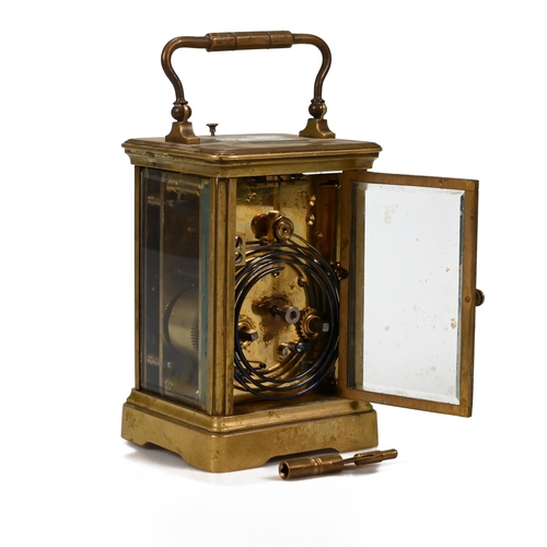 657 - A late 19th Century brass cased repeater carriage clock, striking on coiled gong, with white enamel ... 