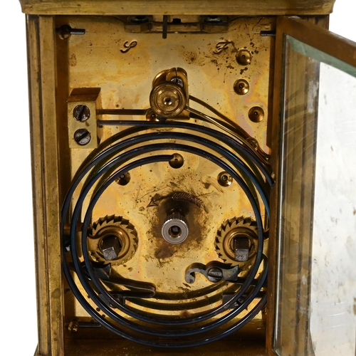 657 - A late 19th Century brass cased repeater carriage clock, striking on coiled gong, with white enamel ... 