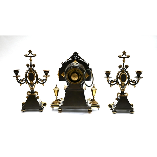 664 - A French Empire Clock and Garniture in bronze and ormolu with Sevres polychrome overglaze painted pl... 