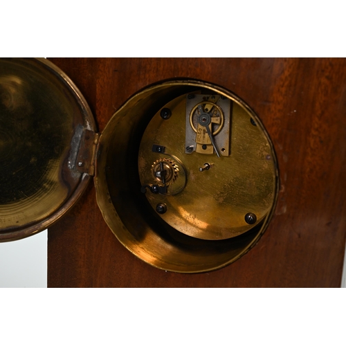 666 - A neat mahogany cased mantle clock, circa 1900, inlaid with fruitwood swags, of unusual footed form,... 