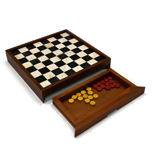 676 - 20th Century marble chessboard in a hardwood frame with two drawers under containing a gilt and silv... 