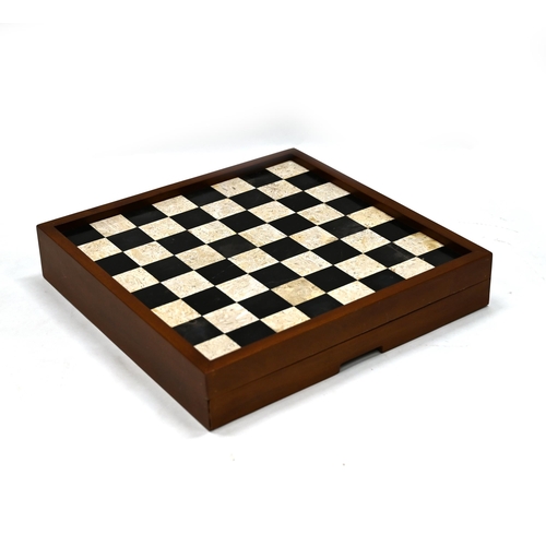 676 - 20th Century marble chessboard in a hardwood frame with two drawers under containing a gilt and silv... 