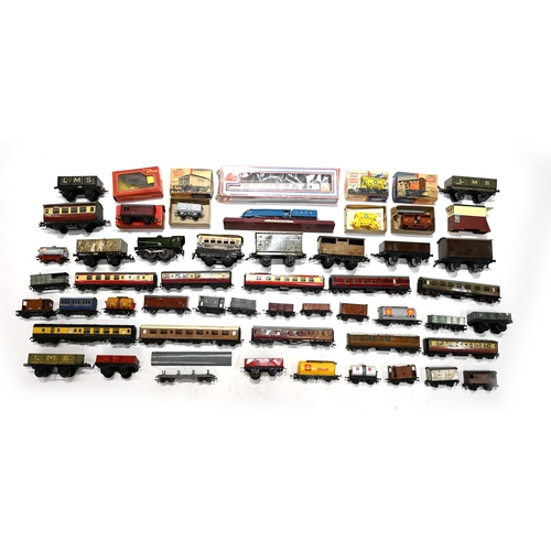 683 - A mixed box of vintage tin-type and plastic toy trains, carriages and wagons. Makers include Hornby,... 