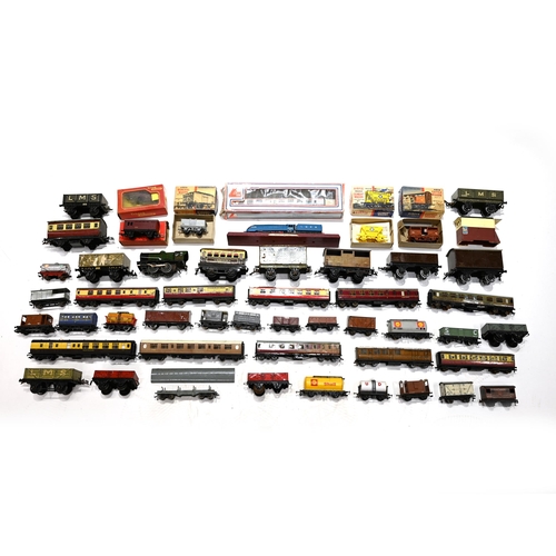 683 - A mixed box of vintage tin-type and plastic toy trains, carriages and wagons. Makers include Hornby,... 