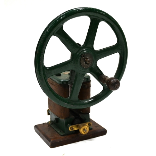 695 - A demonstration dynamo c1870-1900s using the Siemens form. On wooden base with green paint, maker pl... 