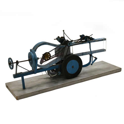 696 - A mid 20th Century hand made teaching/ educational model of an agricultural machine. L 61cm, W 18cm,... 