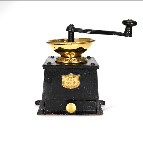 730 - A late 19th Century coffee grinder with case iron body and polished brass bowl. Made by J&J Siddons ... 