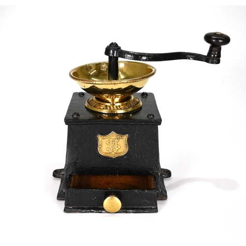 730 - A late 19th Century coffee grinder with case iron body and polished brass bowl. Made by J&J Siddons ... 