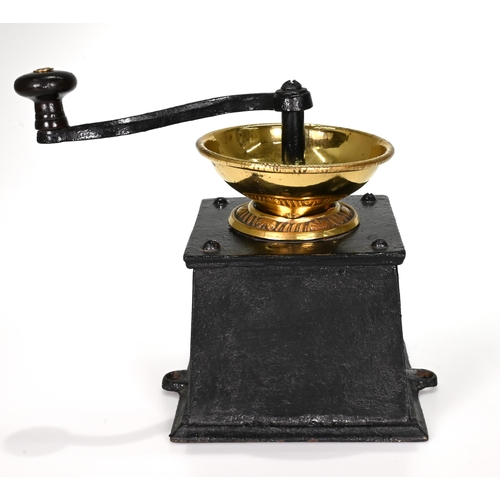 730 - A late 19th Century coffee grinder with case iron body and polished brass bowl. Made by J&J Siddons ... 