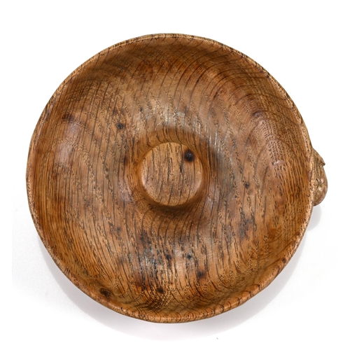 734 - A carved oak pipe smoker's ashtray with central knop for knocking out, with Robert Mouseman Thompson... 