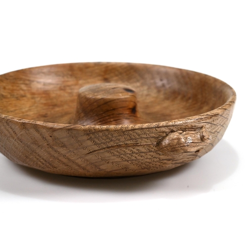 734 - A carved oak pipe smoker's ashtray with central knop for knocking out, with Robert Mouseman Thompson... 