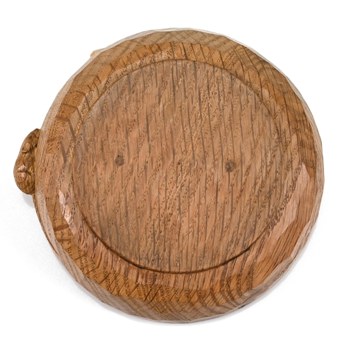 734 - A carved oak pipe smoker's ashtray with central knop for knocking out, with Robert Mouseman Thompson... 