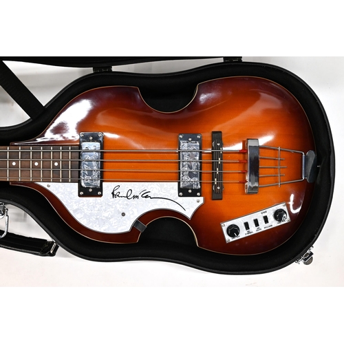 743 - A signed left handed Hofner Bass guitar, signed by Paul McCartney. Sold with a certificate of authen... 