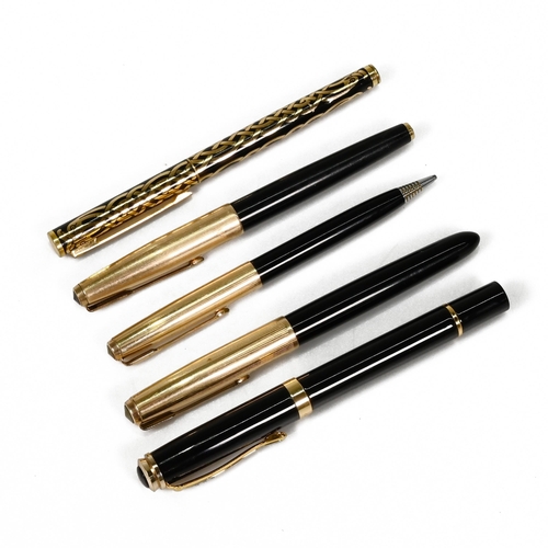 764 - A collection of five writing instruments including a Parker fountain pen with 14k gold nib, the top ... 