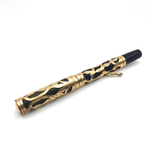 766 - A Waterman 0512 SF Black sleeve with gold filigree overlay pen, stamped 'Pat. Sep 5-1'  and 'Pat Apr... 